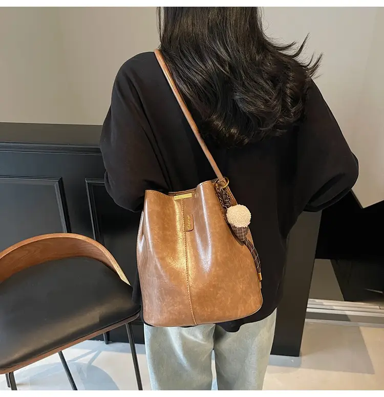 Vintage Brown Leather Bucket Bag with Chain Strap — feature 21