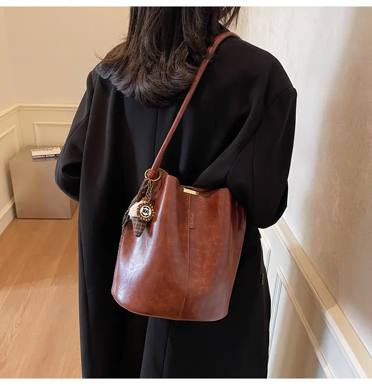 Vintage Brown Leather Bucket Bag with Chain Strap — feature 22
