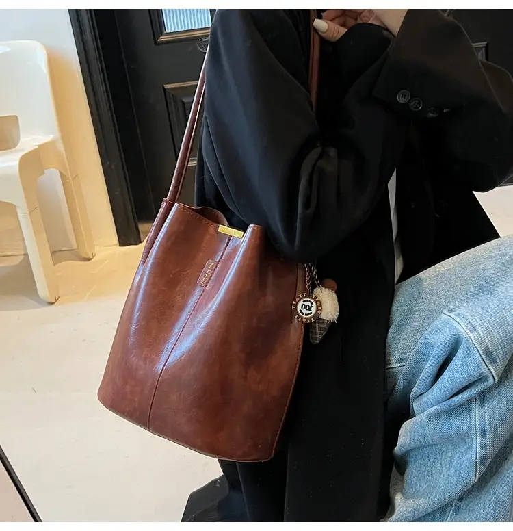 Vintage Brown Leather Bucket Bag with Chain Strap — feature 26