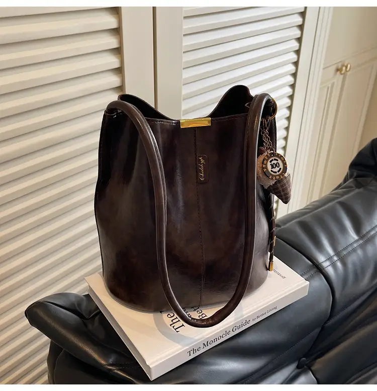 Vintage Brown Leather Bucket Bag with Chain Strap — feature 27