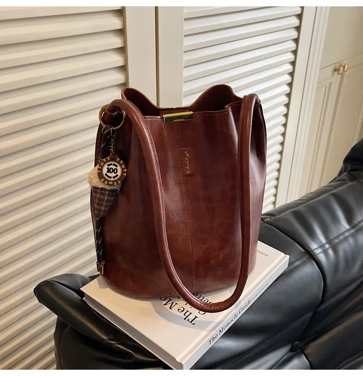 Vintage Brown Leather Bucket Bag with Chain Strap — feature 28