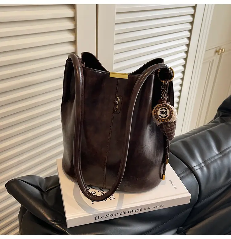Vintage Brown Leather Bucket Bag with Chain Strap — feature 31