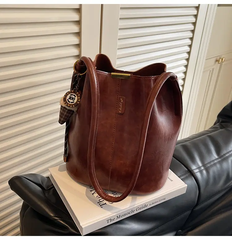 Vintage Brown Leather Bucket Bag with Chain Strap — feature 32