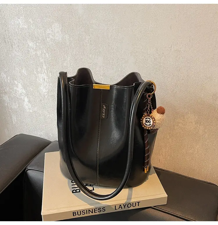 Vintage Brown Leather Bucket Bag with Chain Strap — feature 34