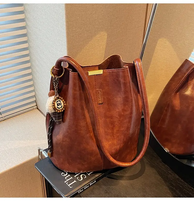 Vintage Brown Leather Bucket Bag with Chain Strap — feature 35