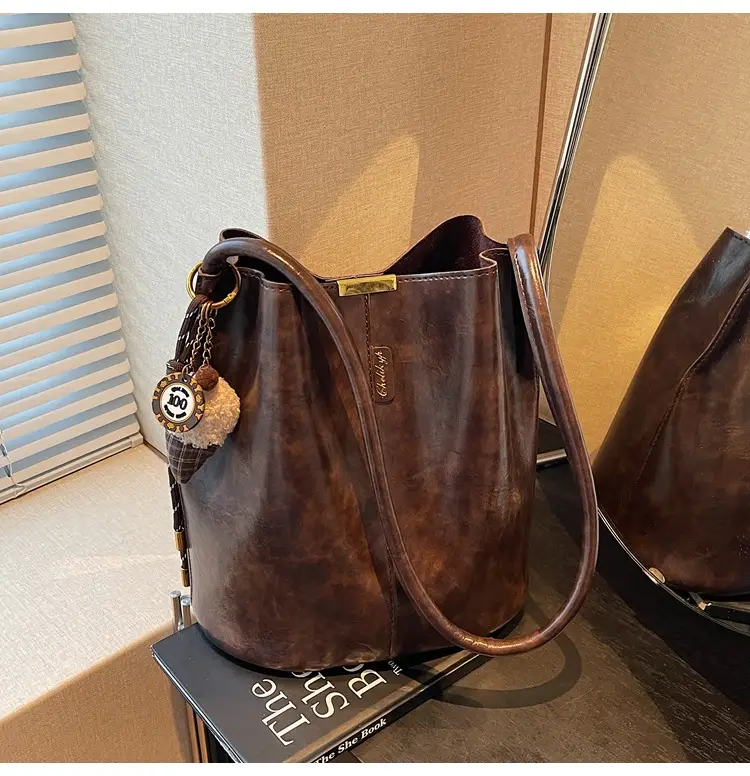 Vintage Brown Leather Bucket Bag with Chain Strap — feature 38
