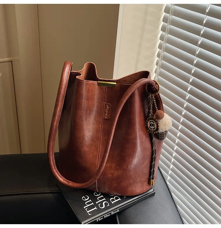 Vintage Brown Leather Bucket Bag with Chain Strap — feature 40
