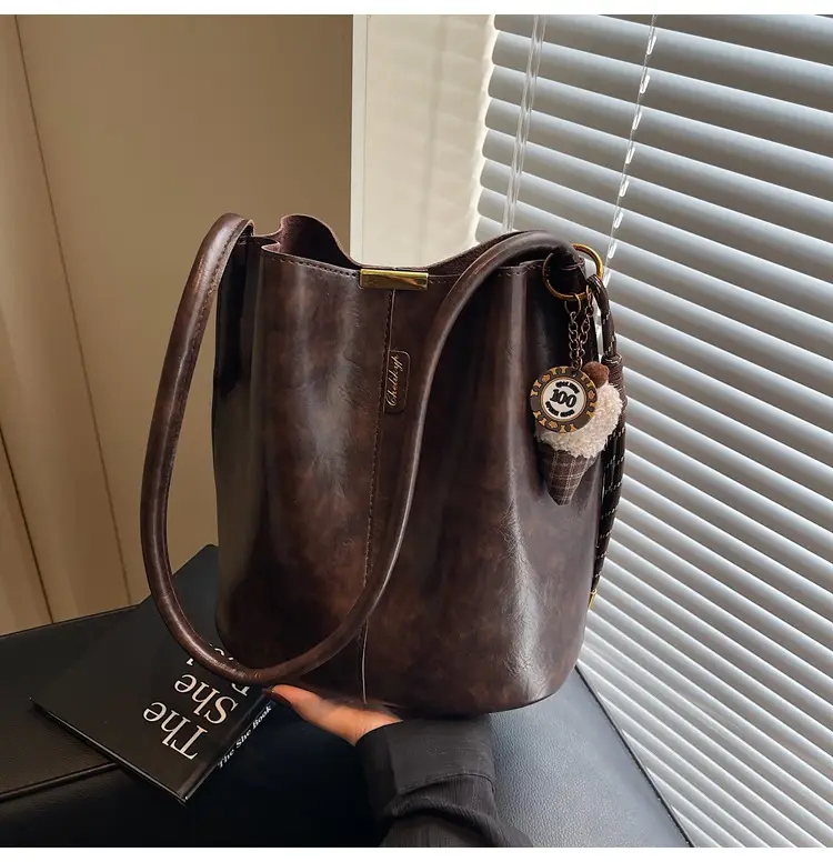 Vintage Brown Leather Bucket Bag with Chain Strap — feature 41