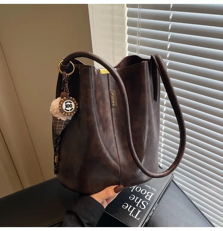 Vintage Brown Leather Bucket Bag with Chain Strap — feature 42