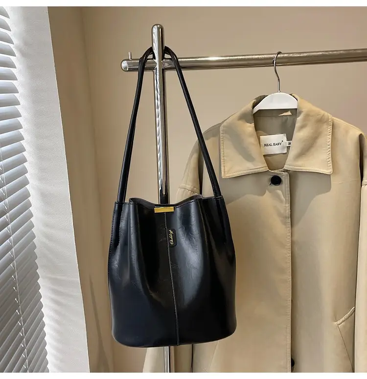Vintage Brown Leather Bucket Bag with Chain Strap — feature 43