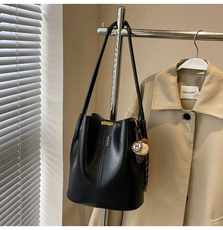 Vintage Brown Leather Bucket Bag with Chain Strap — feature 44