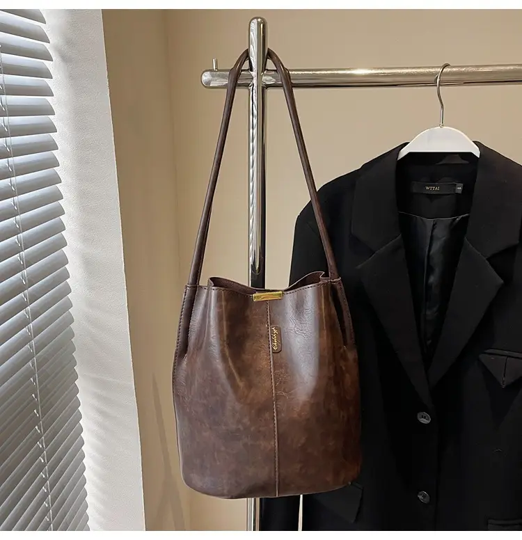 Vintage Brown Leather Bucket Bag with Chain Strap — feature 45