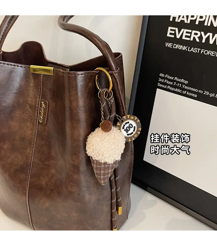 Vintage Brown Leather Bucket Bag with Chain Strap — feature 5