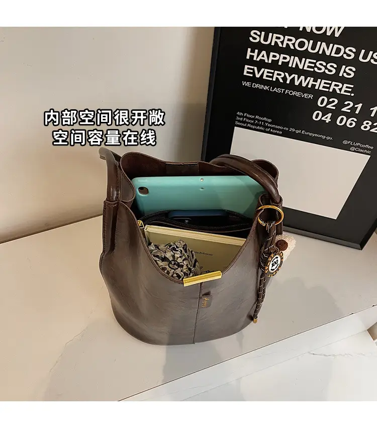 Vintage Brown Leather Bucket Bag with Chain Strap — feature 6