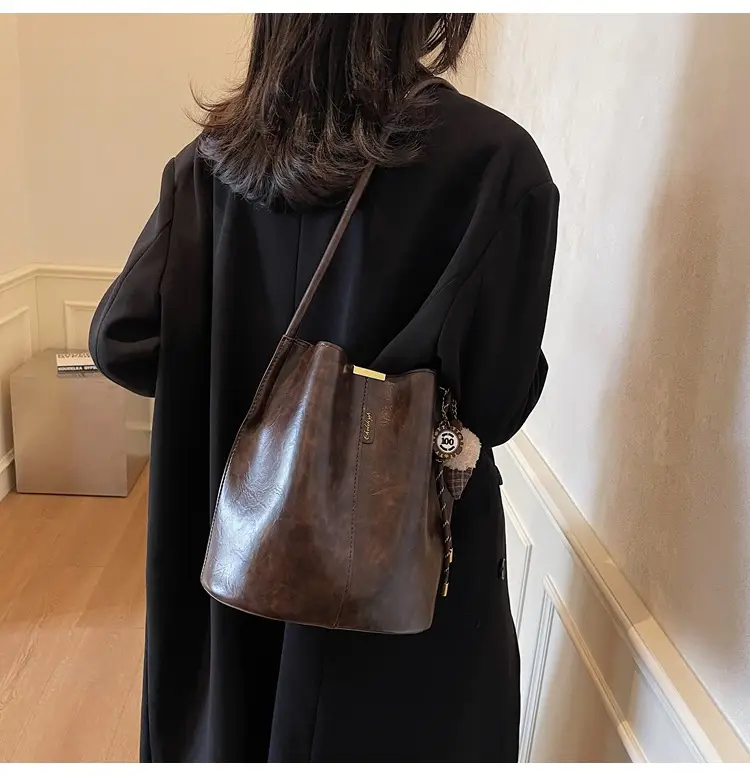 Vintage Brown Leather Bucket Bag with Chain Strap — feature 7