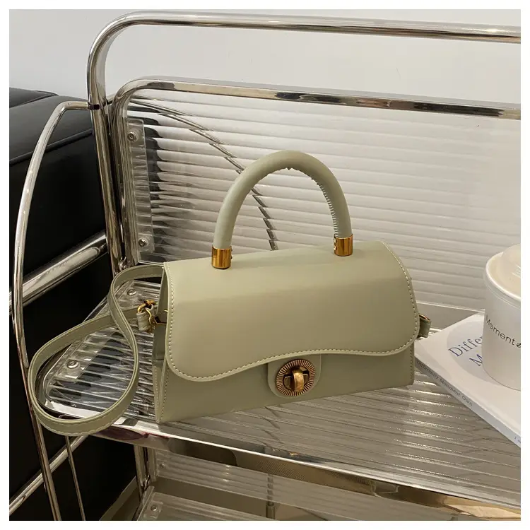Women's Red Textured Shoulder Bag with Gold Clasp — feature 16