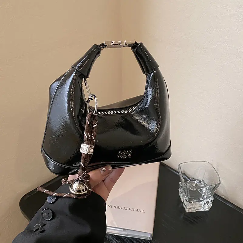 Black Leather Pea Bag with Gold Handle for Women - Image 6