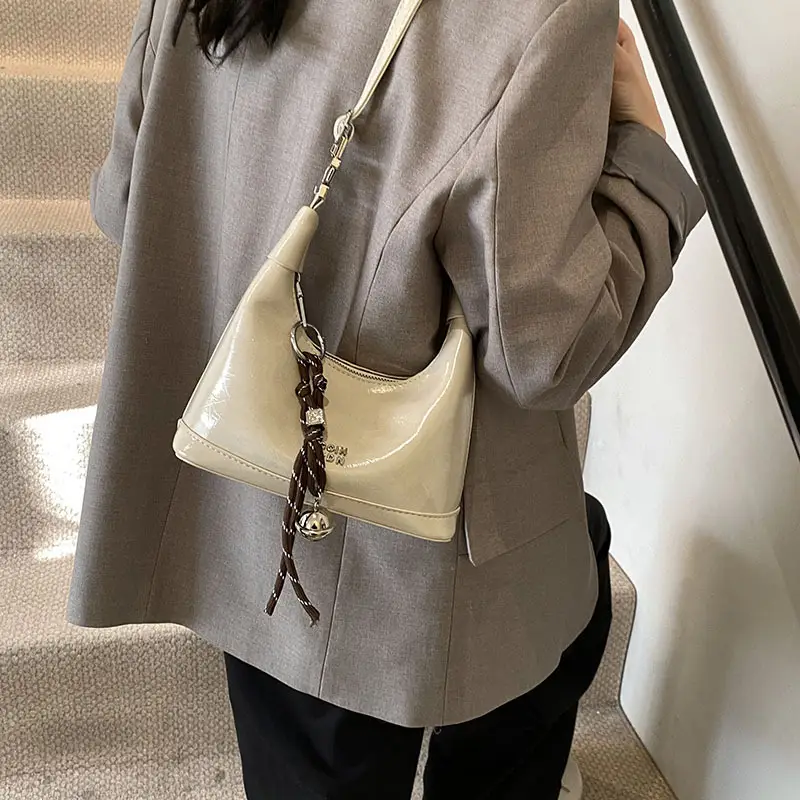 Black Leather Pea Bag with Gold Handle for Women - Image 7