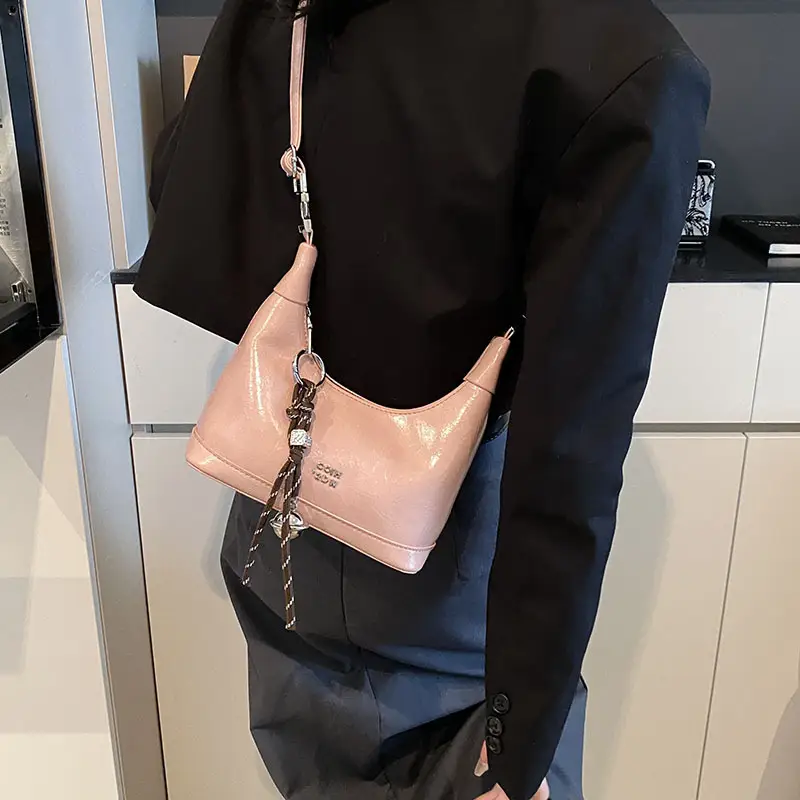 Black Leather Pea Bag with Gold Handle for Women - Image 8