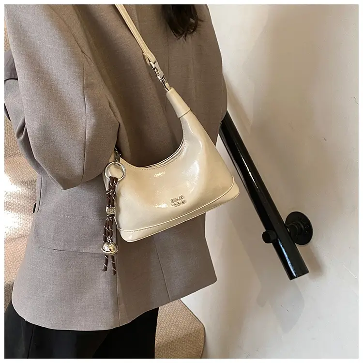 Black Leather Pea Bag with Gold Handle for Women — feature 18