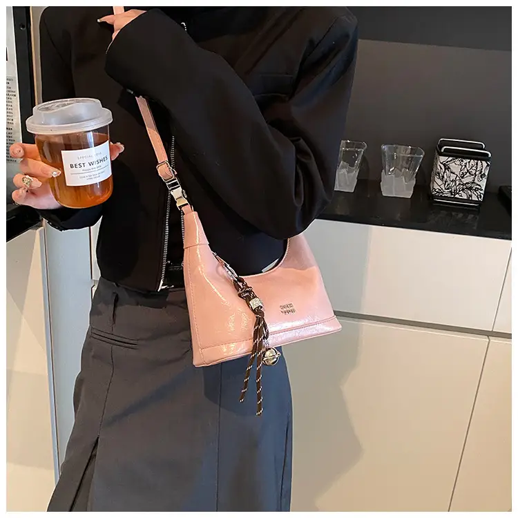 Black Leather Pea Bag with Gold Handle for Women — feature 24