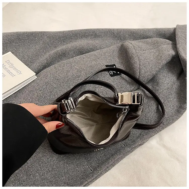 Black Leather Pea Bag with Gold Handle for Women — feature 41