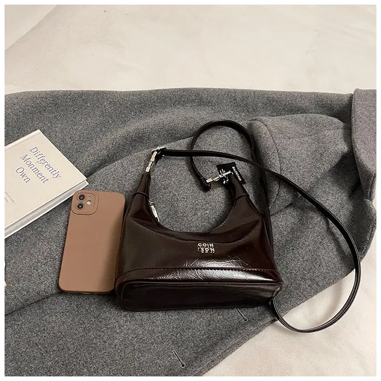 Black Leather Pea Bag with Gold Handle for Women — feature 43