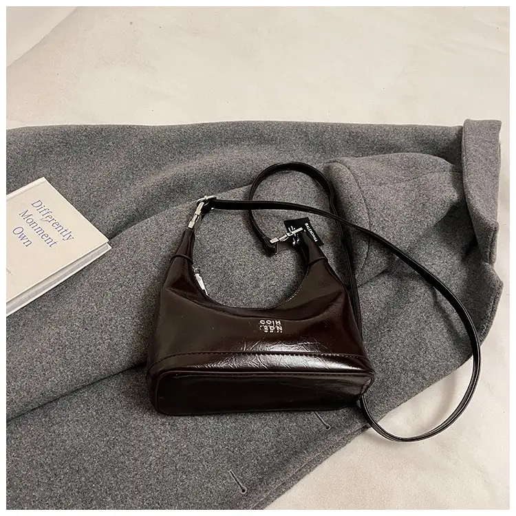 Black Leather Pea Bag with Gold Handle for Women — feature 44