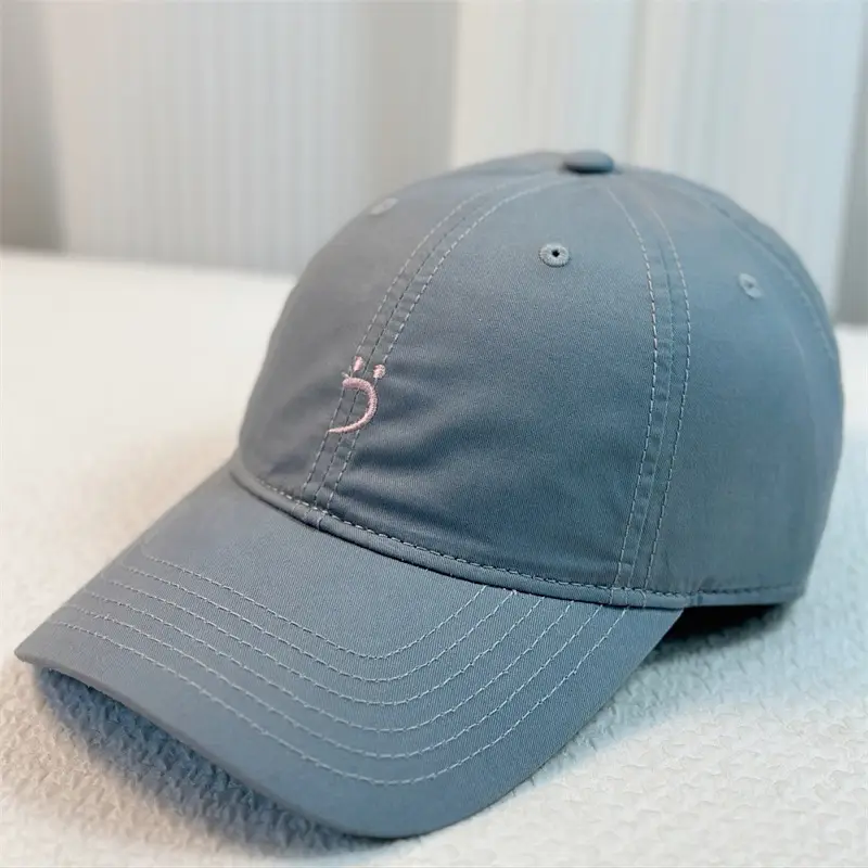 White Embroidered Baseball Cap with Red Design - Image 4
