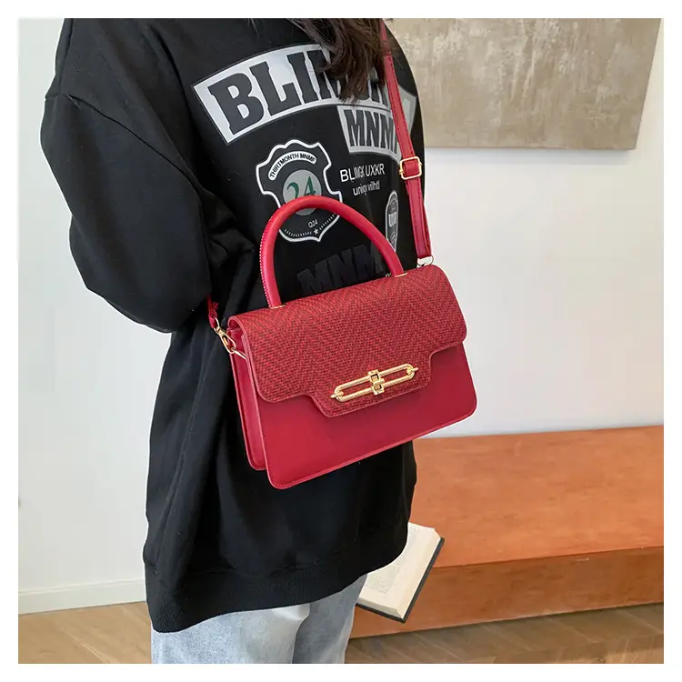 Women's Black Embroidered Shoulder Bag with Gold Clasp — feature 19