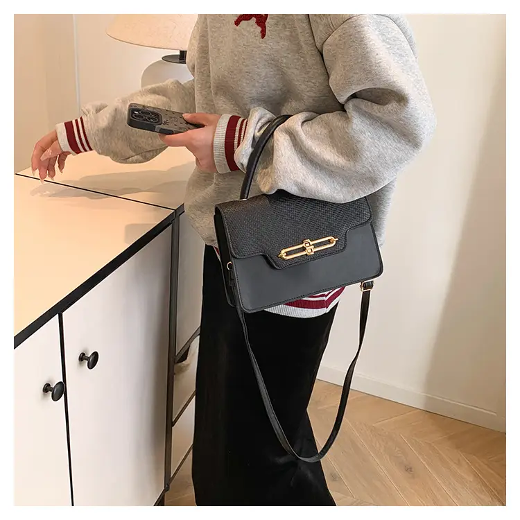 Women's Black Embroidered Shoulder Bag with Gold Clasp — feature 22