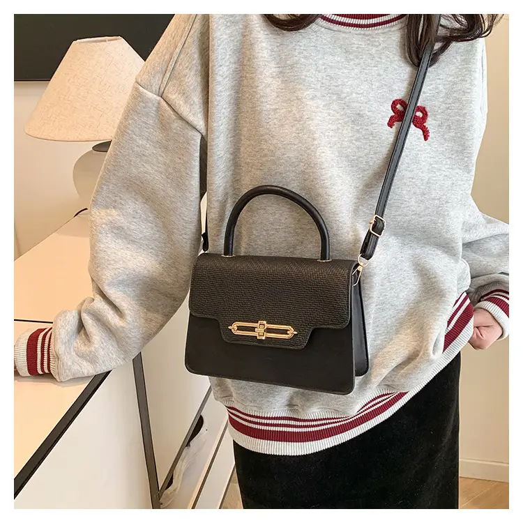 Women's Black Embroidered Shoulder Bag with Gold Clasp — feature 23