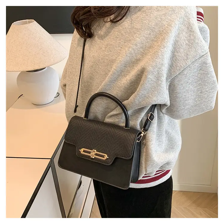 Women's Black Embroidered Shoulder Bag with Gold Clasp — feature 24