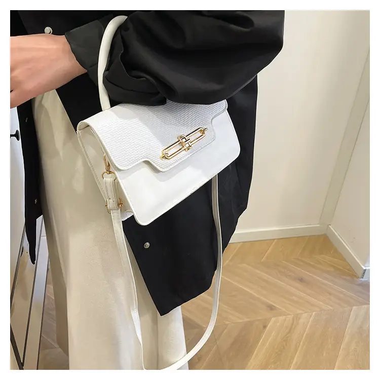 Women's Black Embroidered Shoulder Bag with Gold Clasp — feature 26