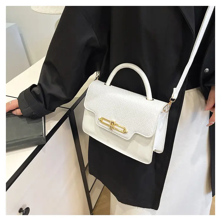 Women's Black Embroidered Shoulder Bag with Gold Clasp — feature 27