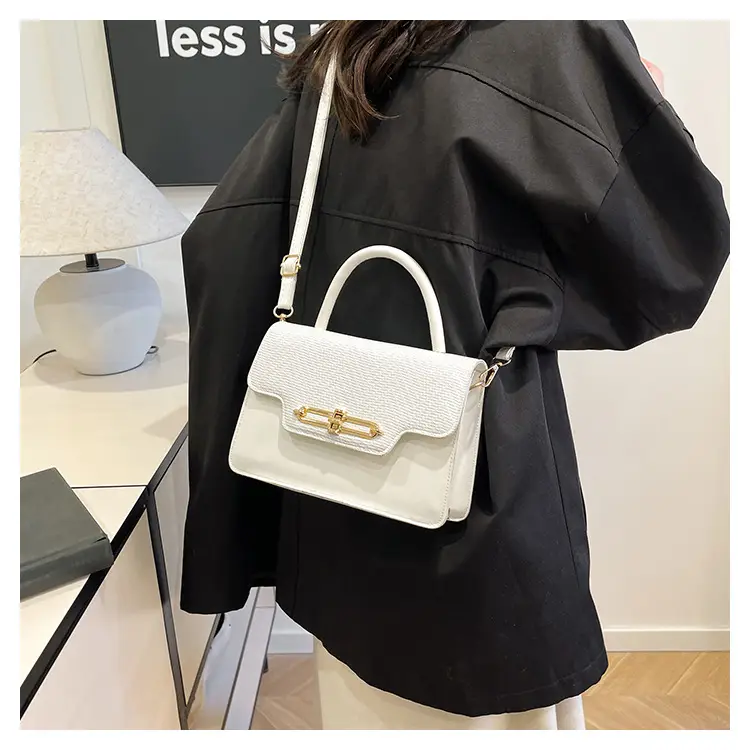 Women's Black Embroidered Shoulder Bag with Gold Clasp — feature 28