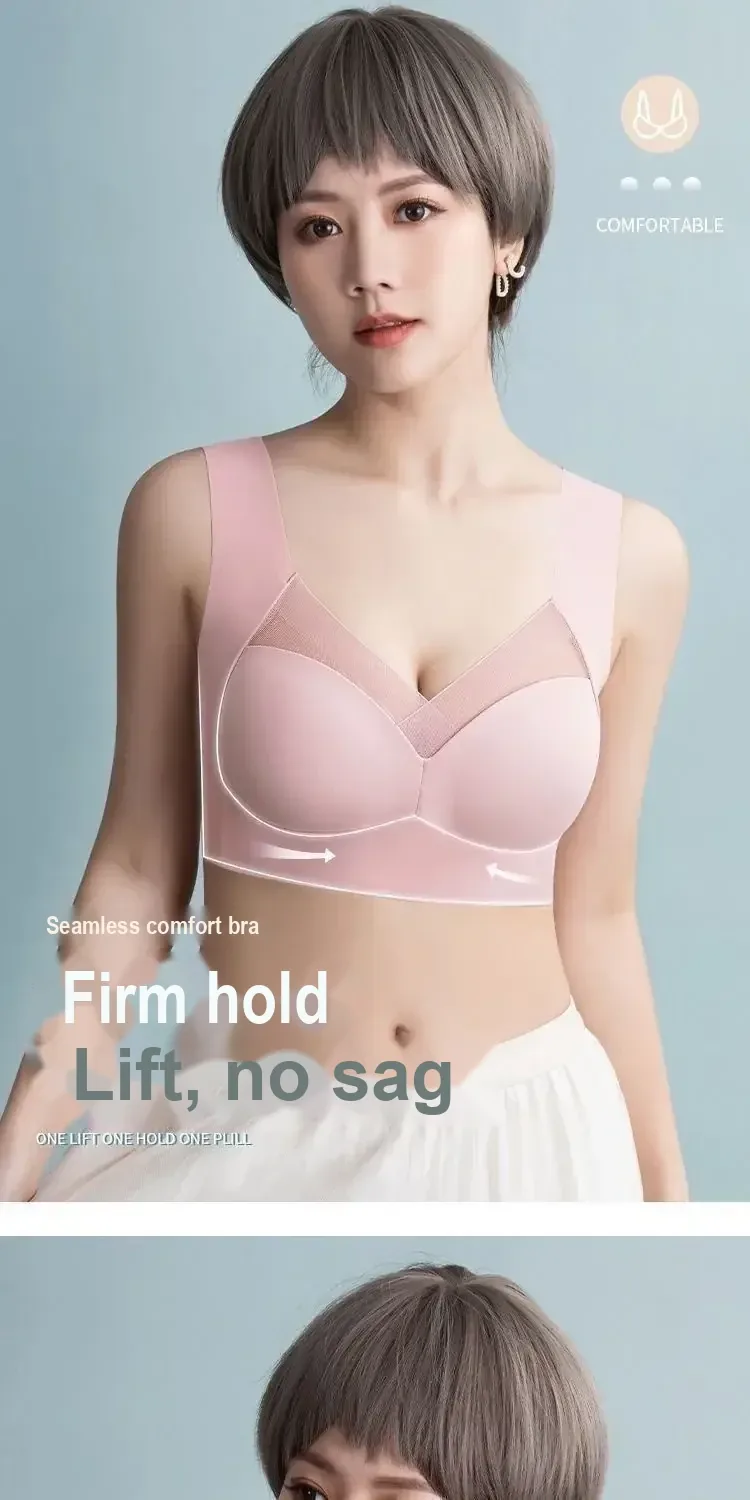 Model wearing a pink bra with wide straps and mesh V-shaped front.