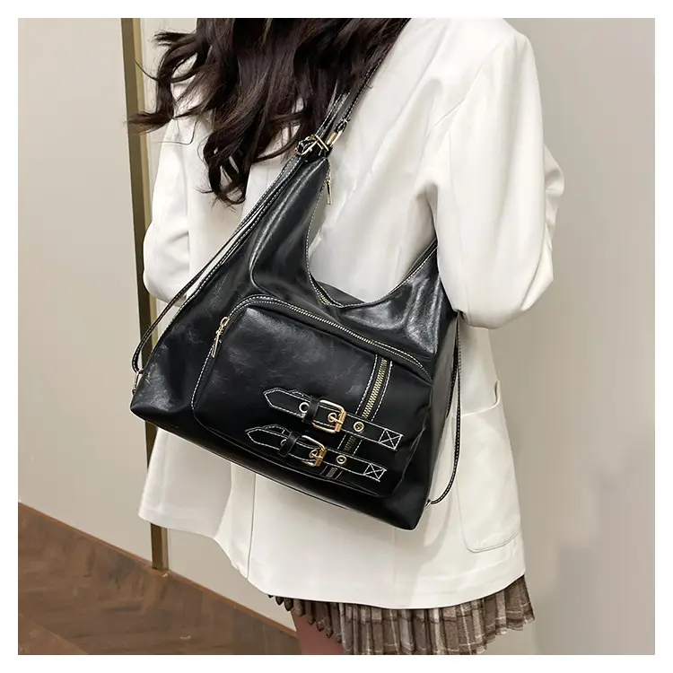 Brown Leather Shoulder Bag with Decorative Buckle — feature 17