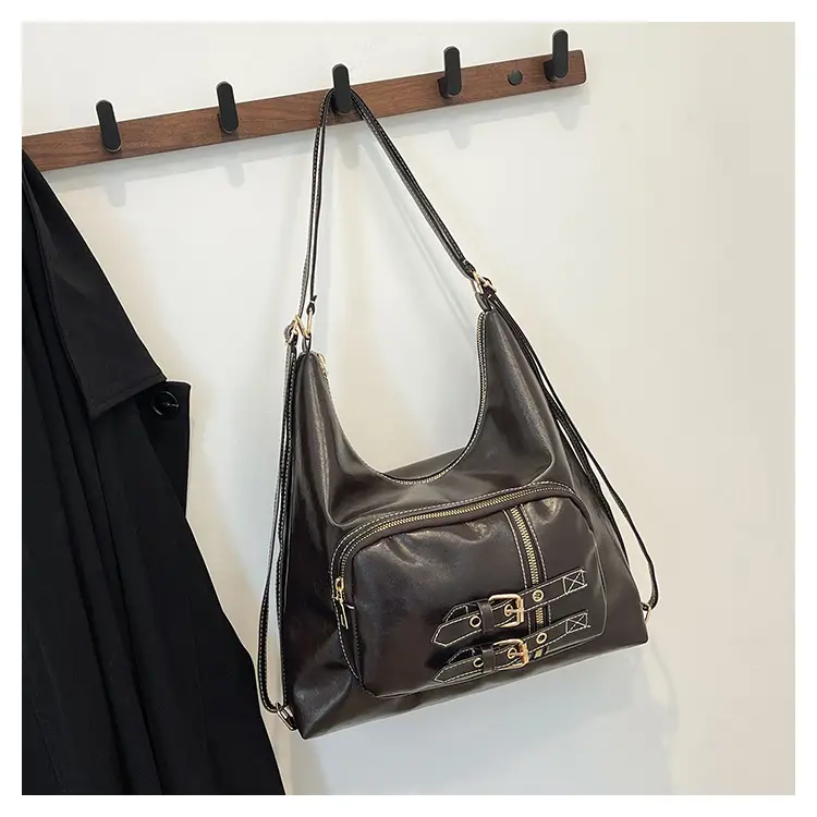 Brown Leather Shoulder Bag with Decorative Buckle — feature 23