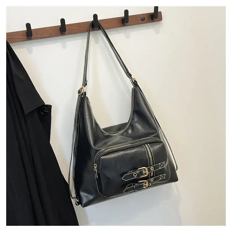 Brown Leather Shoulder Bag with Decorative Buckle — feature 24