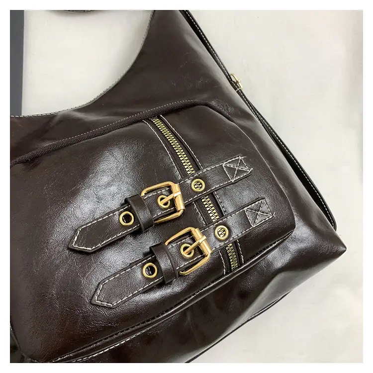 Brown Leather Shoulder Bag with Decorative Buckle — feature 8