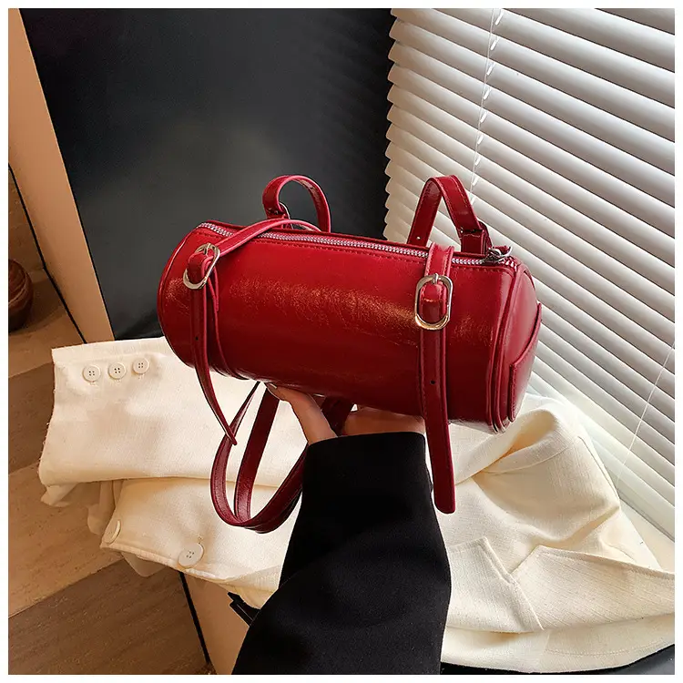 Red Underarm Cylinder Bag for Women 2026 — feature 38