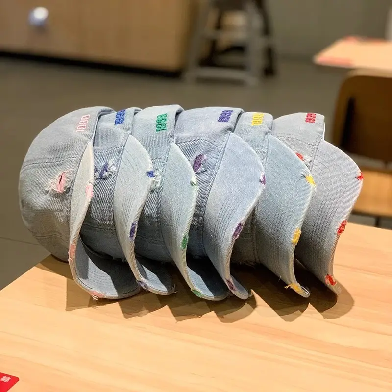 Retro Denim Baseball Cap with Hole Wall Design