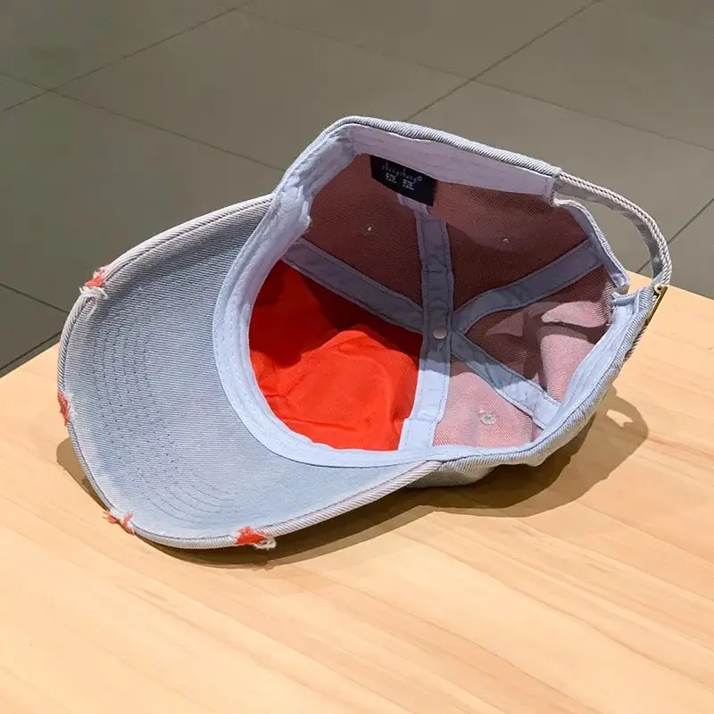 Retro Denim Baseball Cap with Hole Wall Design