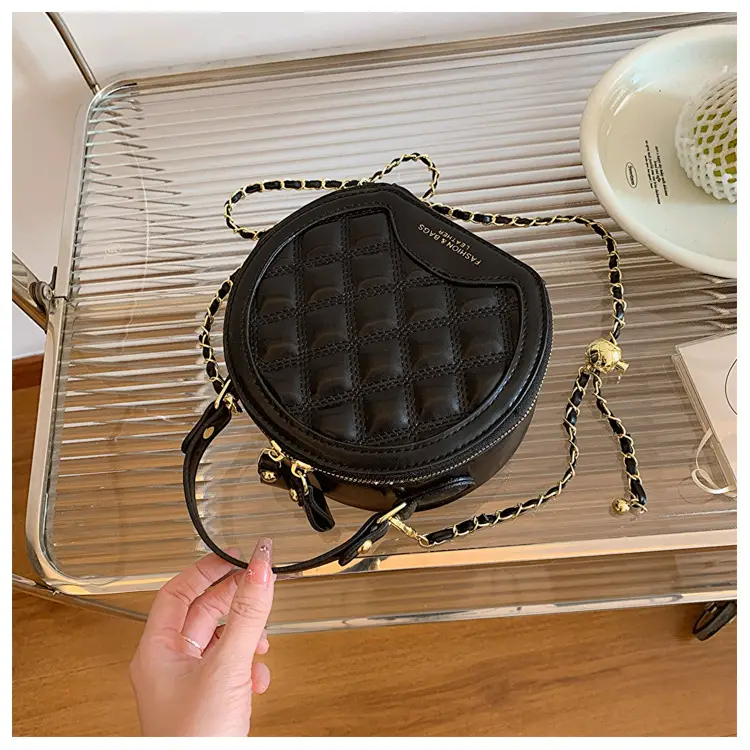 2026 Spring Crossbody Bag Black White Textured Round Handheld — feature 5