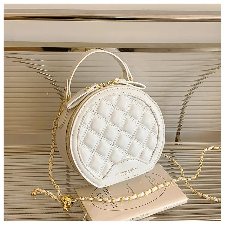 2026 Spring Crossbody Bag Black White Textured Round Handheld — feature 8