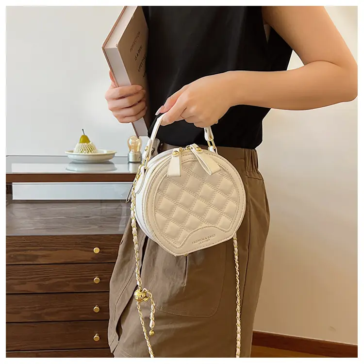 2026 Spring Crossbody Bag Black White Textured Round Handheld — feature 9