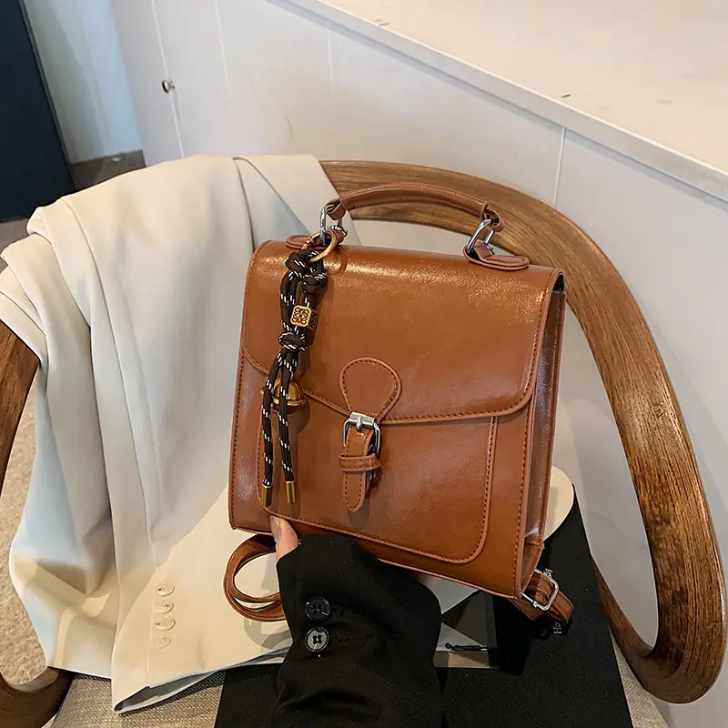 White Western Style Shoulder Bag with Gold Clasp - Image 9
