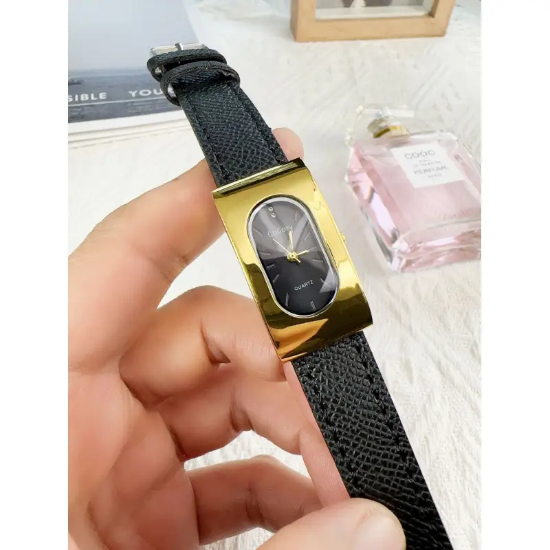 Women's Gold Metal Cold Watch with Black Strap
