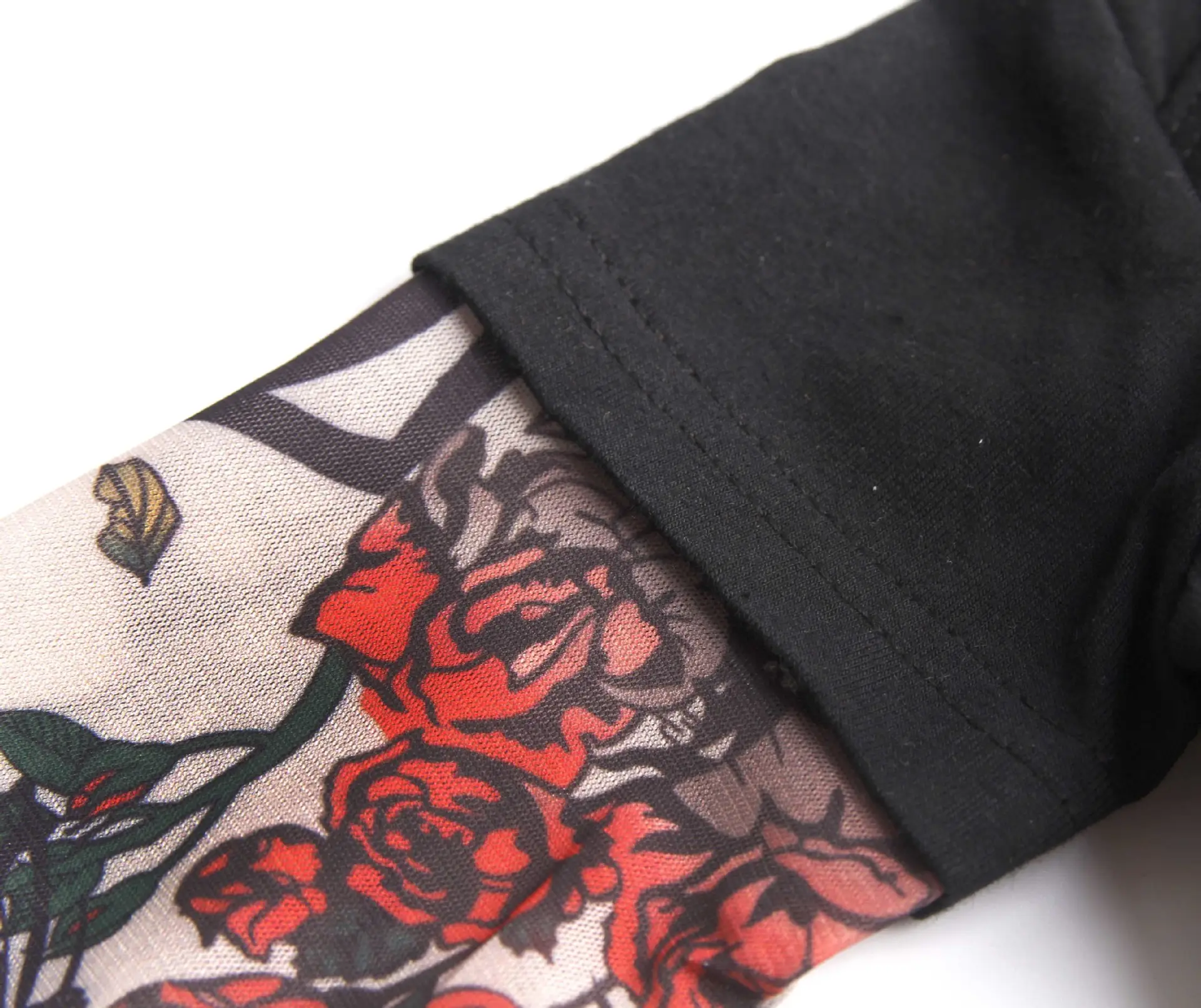 Black Floral Sleeve Baby Onesie with Buttons — feature 8